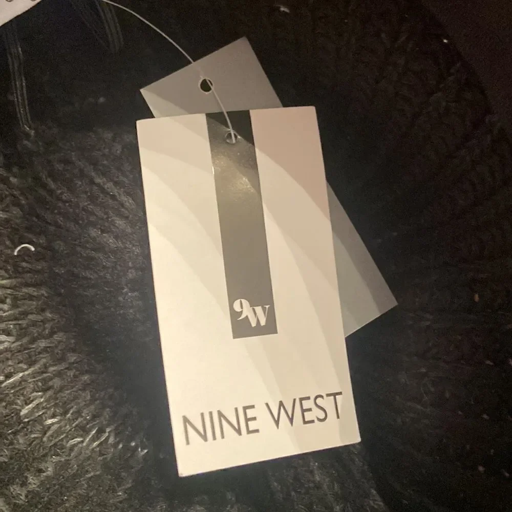 NWT Nine West black hat with adjustable fit band